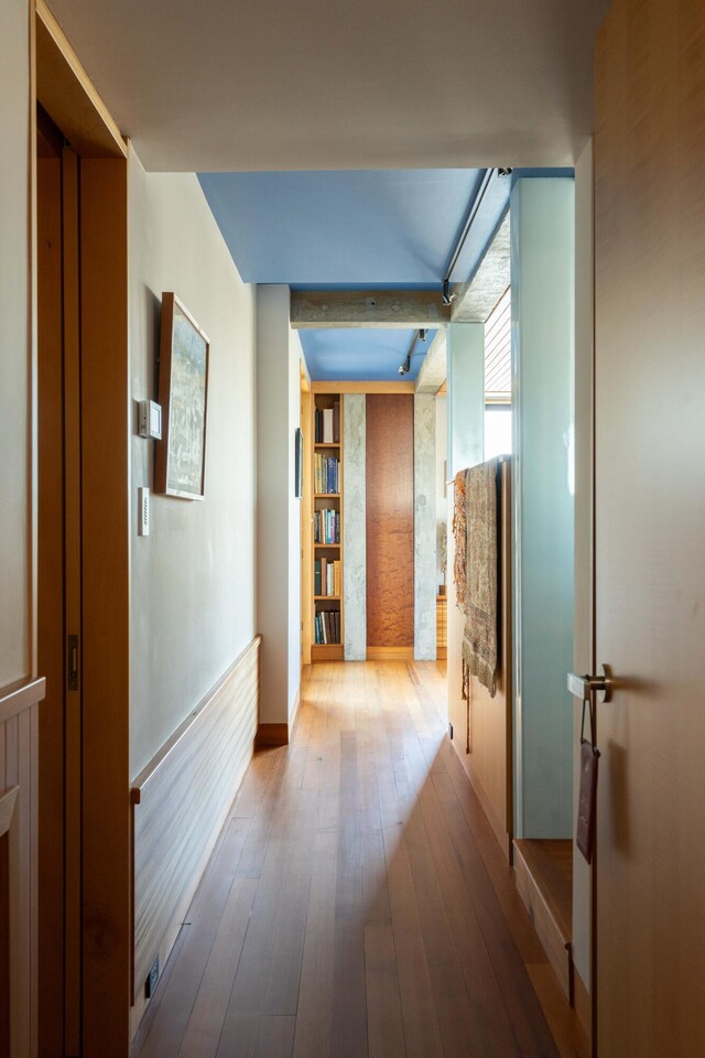 905 Palm Blvd, Isle Of Palms, SC 29451 - hallway featuring wood finished floors and baseboards