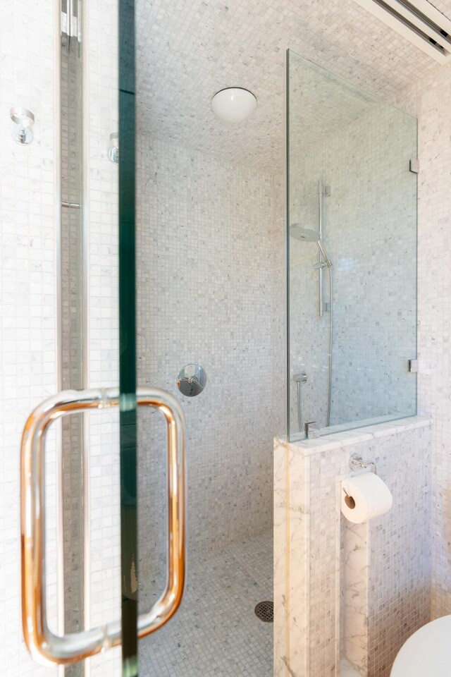 905 Palm Blvd, Isle Of Palms, SC 29451 - bathroom with a stall shower and tile walls