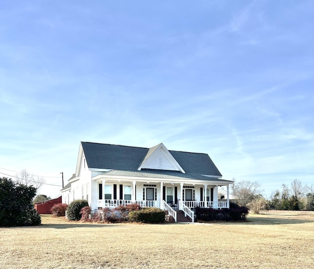 view of front facade with a porch and a front yard