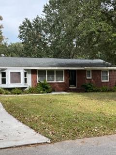 view of front of home with a front yard