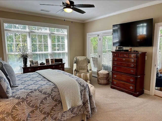 carpeted bedroom with ceiling fan, access to exterior, and ornamental molding