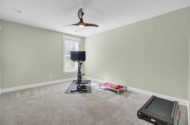 workout room featuring visible vents, baseboards, carpet floors, and ceiling fan