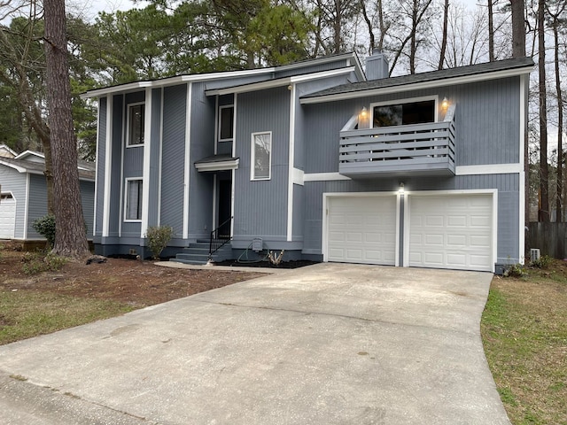 view of front of home featuring a balcony and a garage