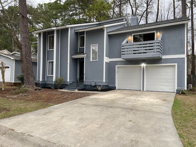 view of front of home featuring a balcony and a garage