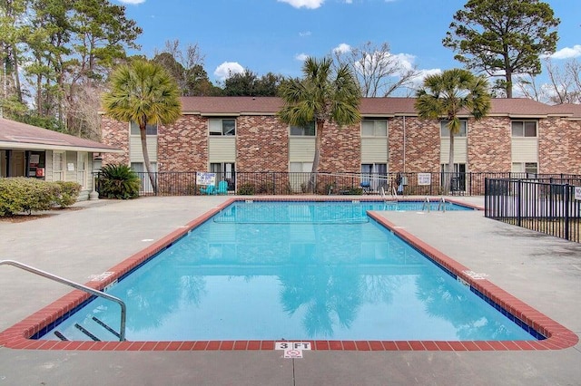 community pool with fence