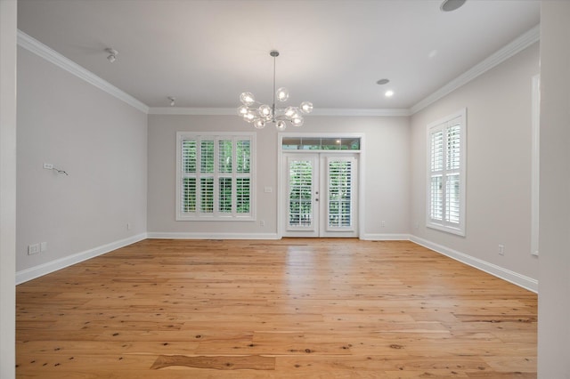 5152 Coral Reef Dr, Johns Island, SC 29455 - spare room featuring healthy amount of natural light, a chandelier, light wood-style floors, ornamental molding, and recessed lighting