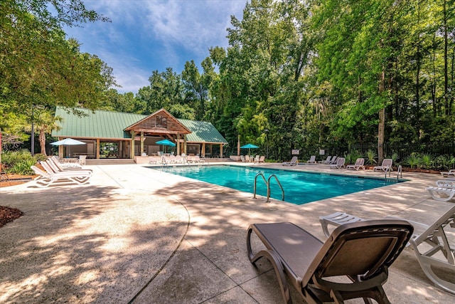 5152 Coral Reef Dr, Johns Island, SC 29455 - community pool with a patio area
