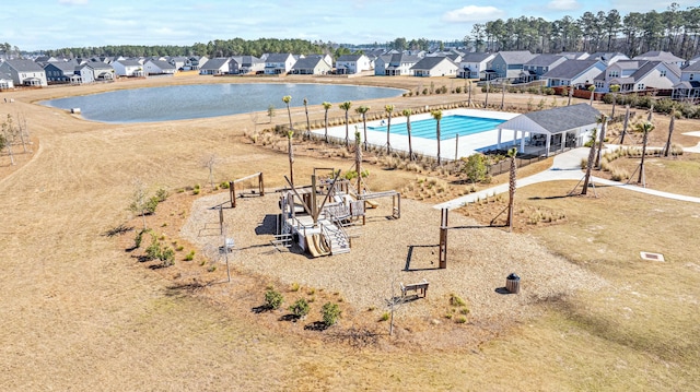 exterior space with a water view and a residential view