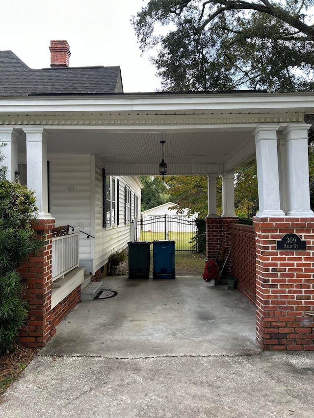 view of parking with a carport