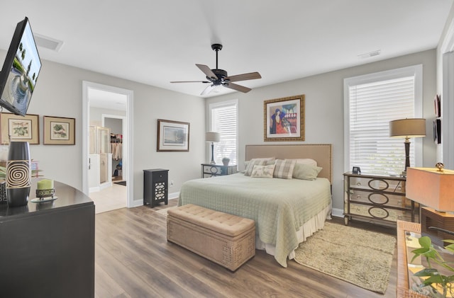 bedroom featuring light hardwood / wood-style floors and ceiling fan