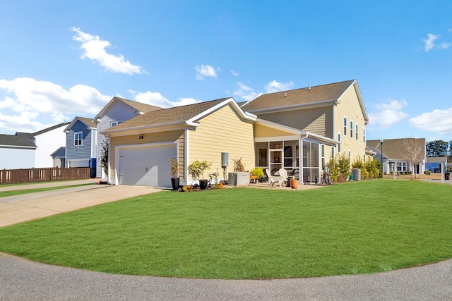 view of front of house featuring a garage, a sunroom, a front yard, and cooling unit