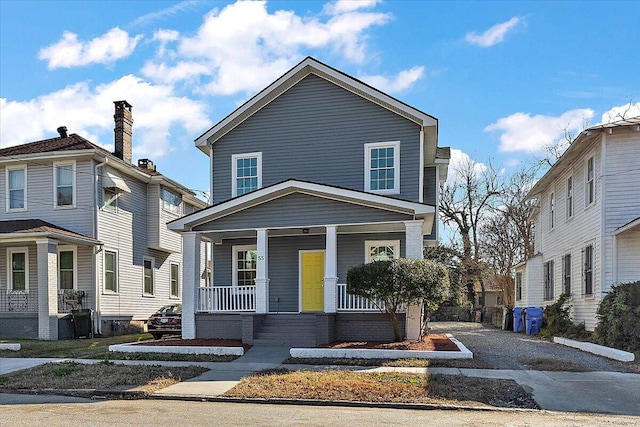 view of front of home featuring covered porch