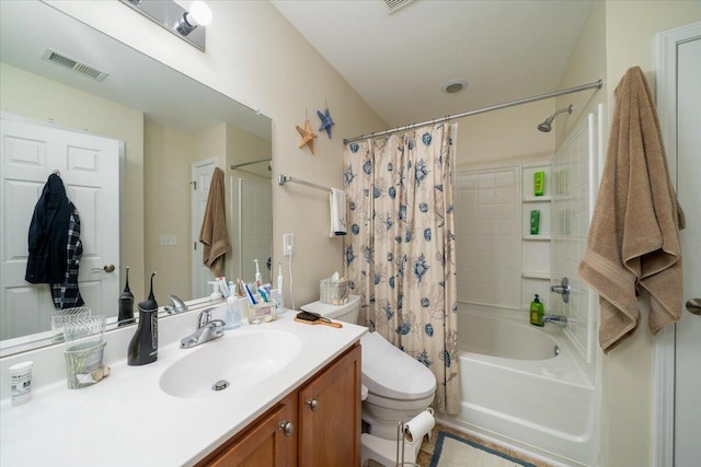 full bathroom featuring vanity, shower / tub combo, and toilet