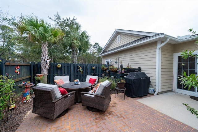 view of patio with a grill