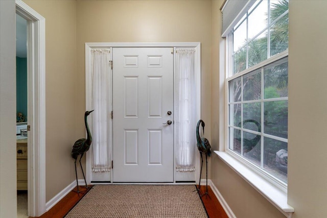 entrance foyer with hardwood / wood-style floors