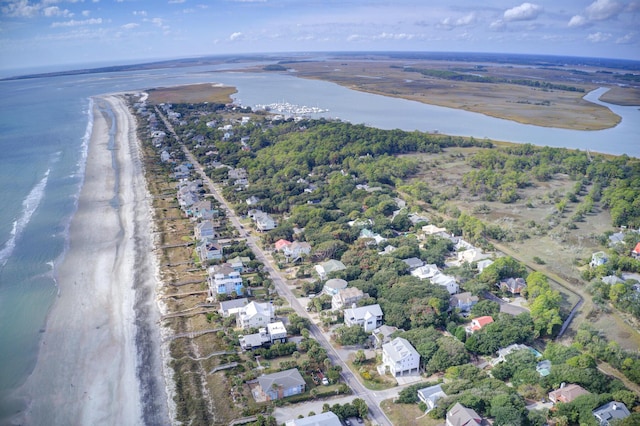 aerial view featuring a water view and a beach view