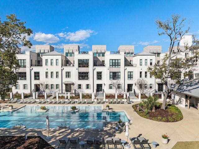 community pool featuring a patio