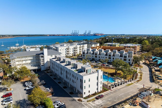 birds eye view of property featuring a water view