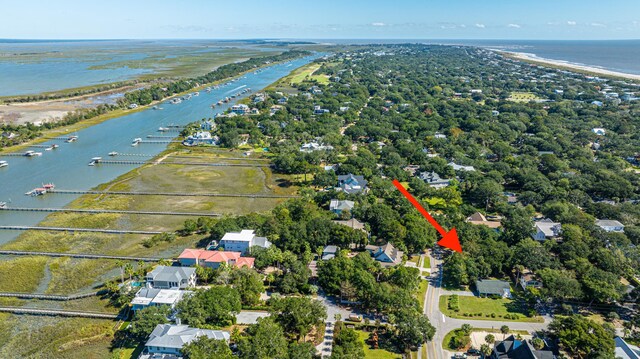 birds eye view of property featuring a water view