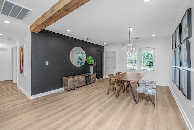 dining area featuring an inviting chandelier, crown molding, beam ceiling, and light hardwood / wood-style flooring