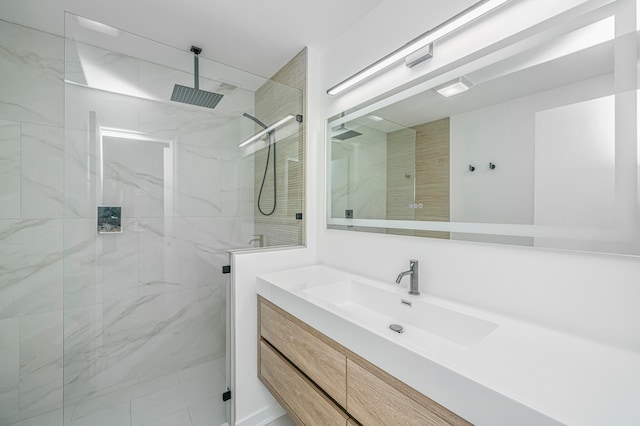 bathroom featuring vanity and walk in shower