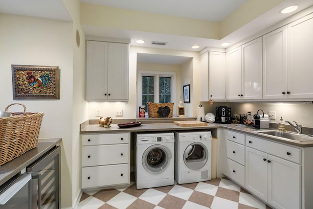 3121 Marshgate Dr, Seabrook Island, SC 29455 - washroom with washing machine and clothes dryer, light flooring, beverage cooler, and recessed lighting
