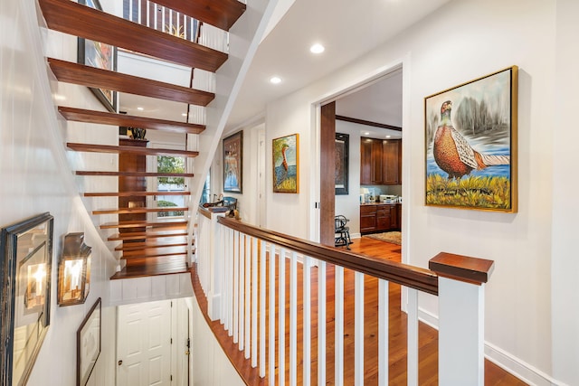 3121 Marshgate Dr, Seabrook Island, SC 29455 - corridor featuring wood finished floors, recessed lighting, and stairway