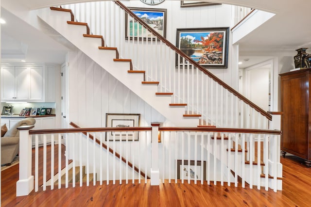 3121 Marshgate Dr, Seabrook Island, SC 29455 - stairs featuring hardwood / wood-style floors, recessed lighting, and ornamental molding