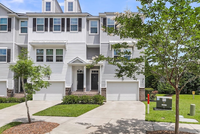 348 Spindlewood Way, Charleston, SC 29414 - multi unit property with board and batten siding, brick siding, concrete driveway, a front yard, and a garage
