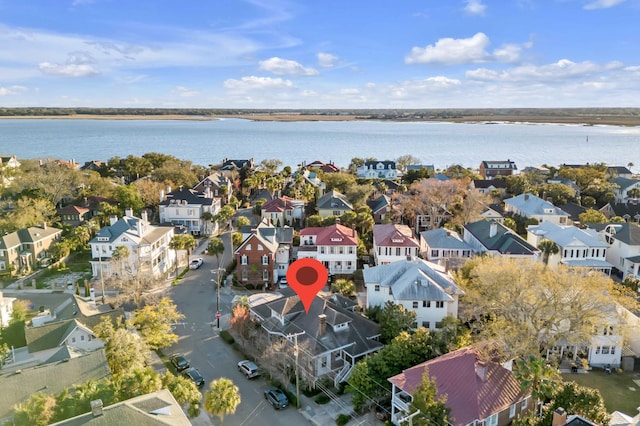 aerial view with a water view and a residential view