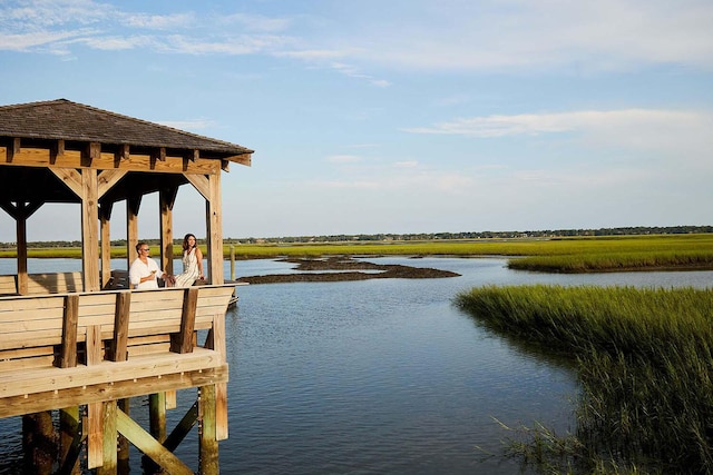 view of dock with a water view