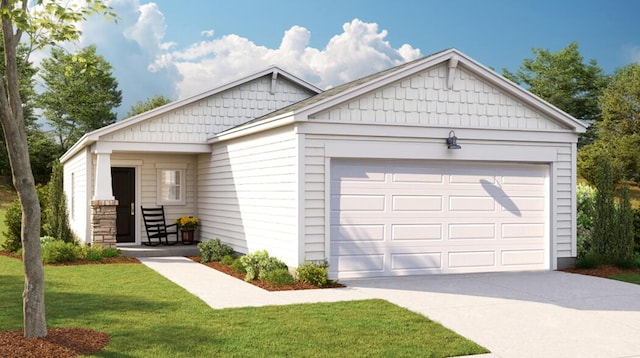 view of front of house featuring a garage and a front yard