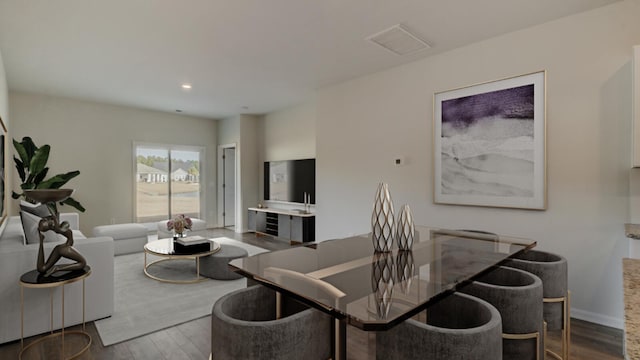 living room with dark wood-type flooring