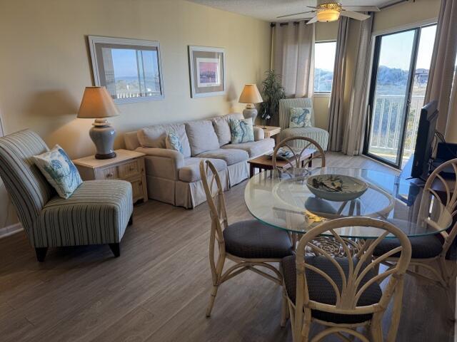 interior space featuring hardwood / wood-style flooring and ceiling fan