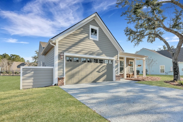 view of front of property featuring brick siding, fence, a garage, driveway, and a front lawn