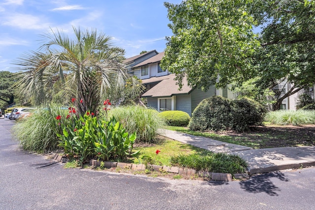 1120 Hidden Cove Dr Unit I, Mount Pleasant, SC 29464 - obstructed view of property with roof with shingles