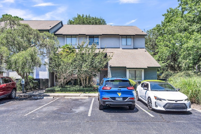1120 Hidden Cove Dr Unit I, Mount Pleasant, SC 29464 - view of front of house with uncovered parking and roof with shingles