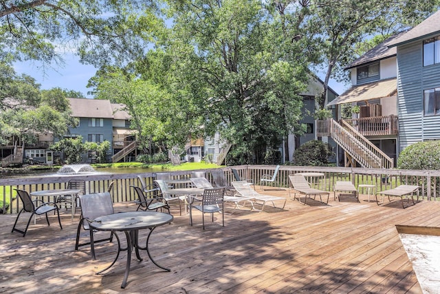 1120 Hidden Cove Dr Unit I, Mount Pleasant, SC 29464 - wooden terrace featuring stairway, a water view, and outdoor dining space