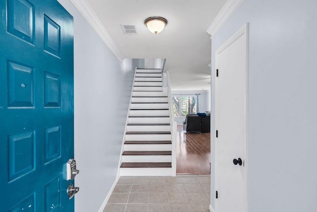 1120 Hidden Cove Dr Unit I, Mount Pleasant, SC 29464 - foyer featuring crown molding, stairs, and light tile patterned floors