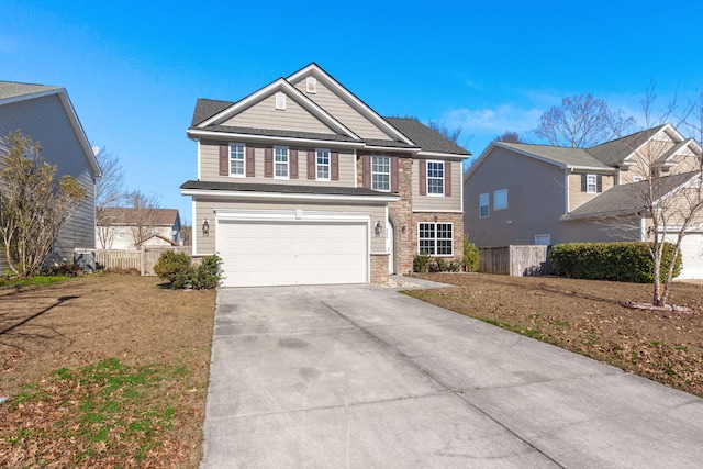 view of front of house with a front lawn and a garage