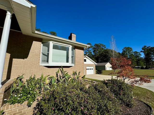 view of property exterior featuring a garage