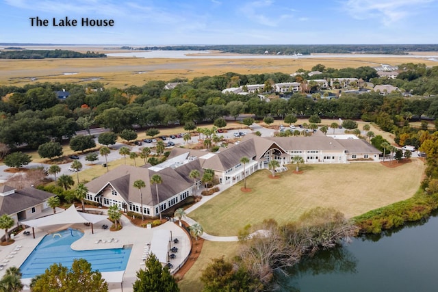 birds eye view of property featuring a water view