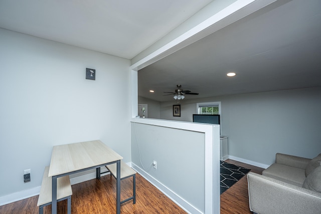 interior space featuring ceiling fan and dark hardwood / wood-style flooring