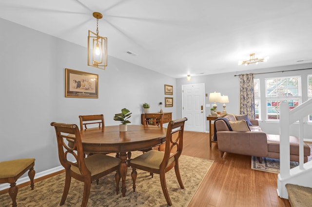 dining room with light hardwood / wood-style flooring