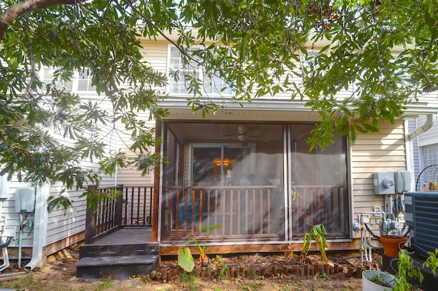 rear view of house with central air condition unit