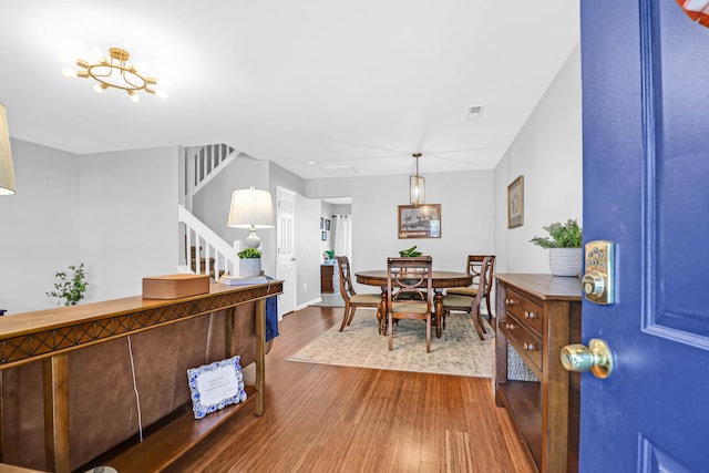 dining room with hardwood / wood-style flooring