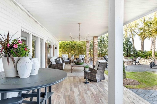 deck featuring outdoor dining area