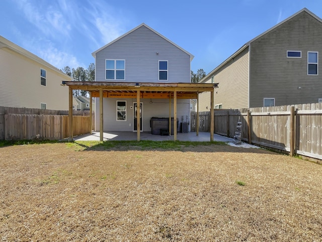 back of property featuring a patio area, a lawn, a fenced backyard, and central AC unit