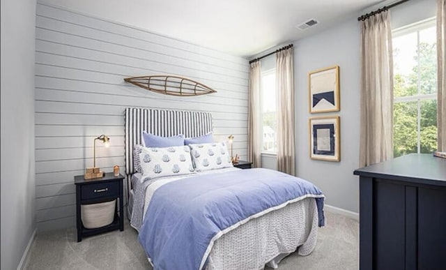 774 Clay Field Trl, Summerville, SC 29485 - bedroom with light colored carpet, multiple windows, baseboards, and wooden walls