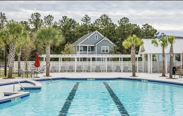 774 Clay Field Trl, Summerville, SC 29485 - community pool featuring a hot tub, fence, and a patio area